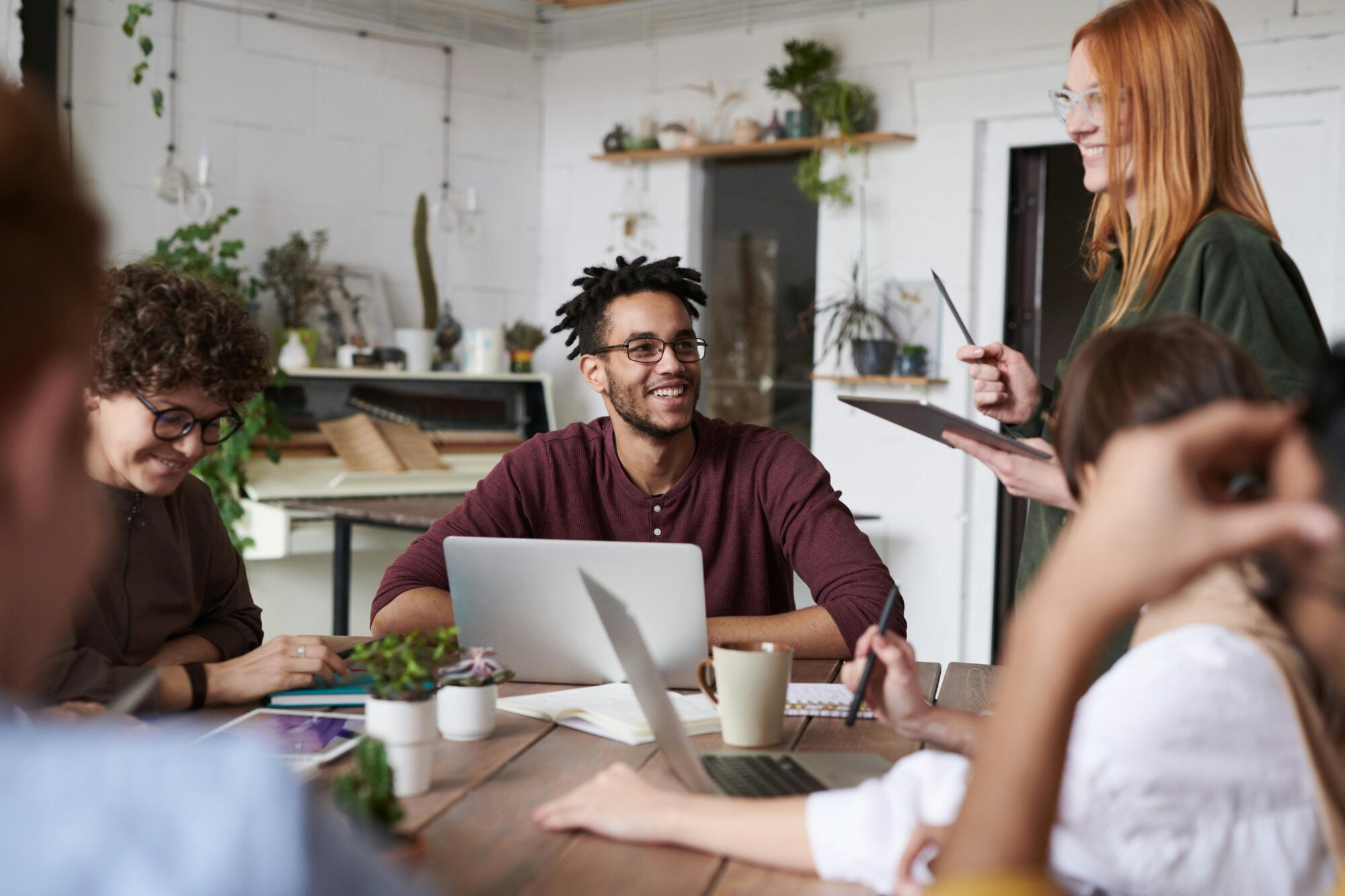 Small business team collaborating in a casual office meeting
